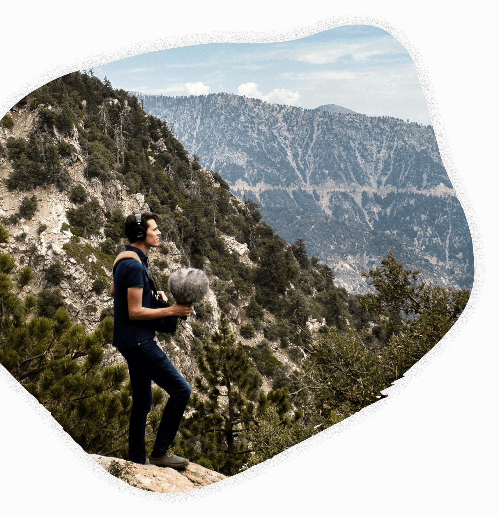 Picture of Zach on a rock